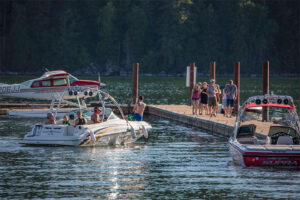 A group of people pulling up at dover Bay Marina.