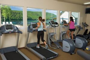 People working out at a Dover Bay resort, which is close to Schweitzer Mountain.
