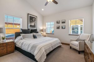 A bedroom at a Sandpoint resort rental near fun things to do in Idaho with family.